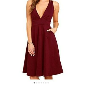 Wine tea length, deep v dress with pockets
